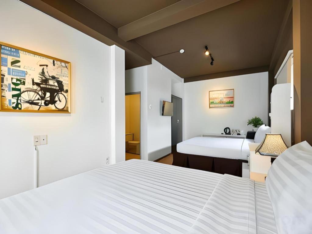 הו צ'י מין סיטי The Noble Swan Wood Park Hotel מראה חיצוני תמונה