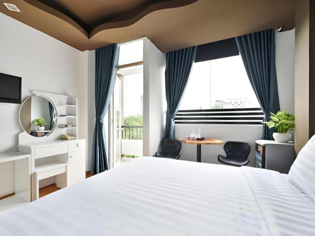 הו צ'י מין סיטי The Noble Swan Wood Park Hotel מראה חיצוני תמונה
