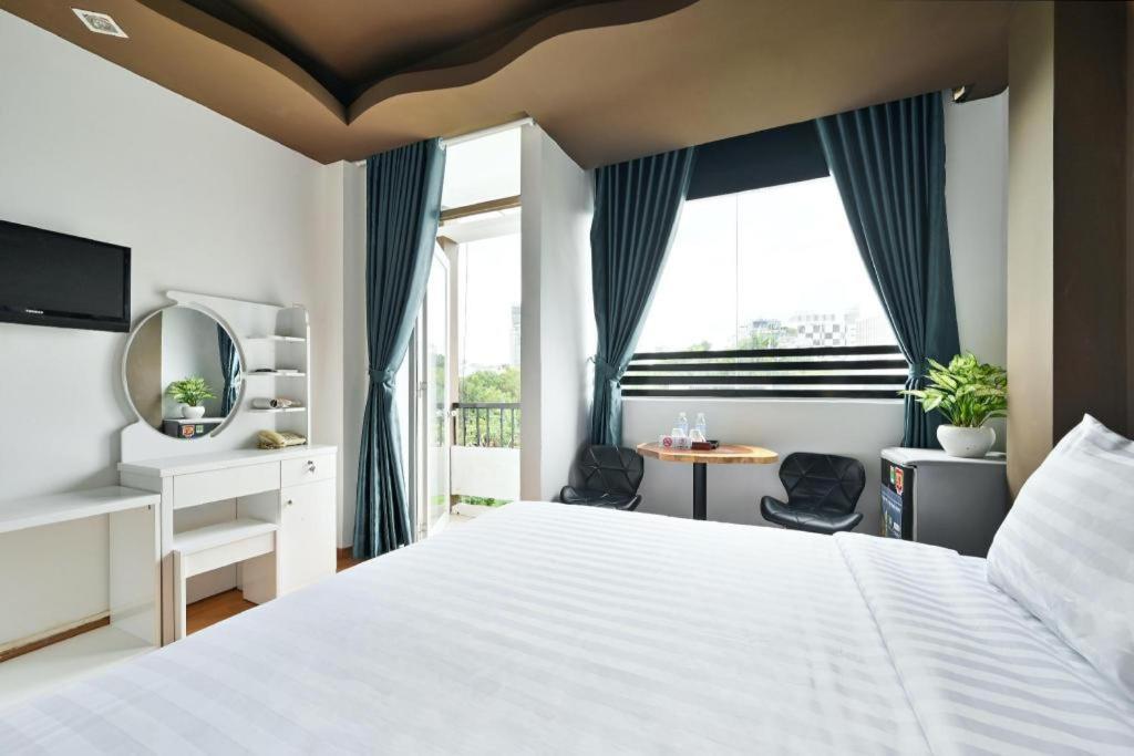 הו צ'י מין סיטי The Noble Swan Wood Park Hotel מראה חיצוני תמונה